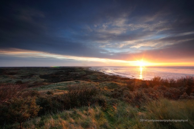 Waddenzee: zonsopgang en zonsondergang